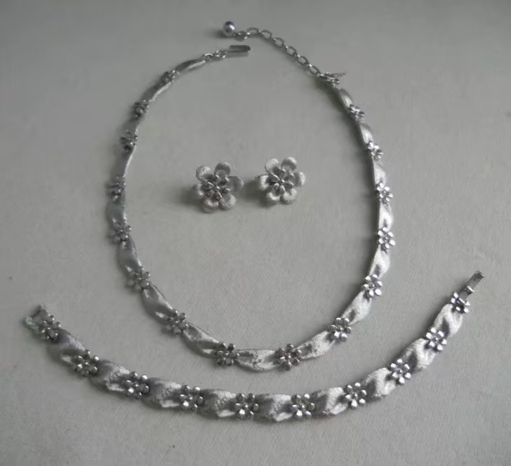 Woman wearing vintage silver necklace