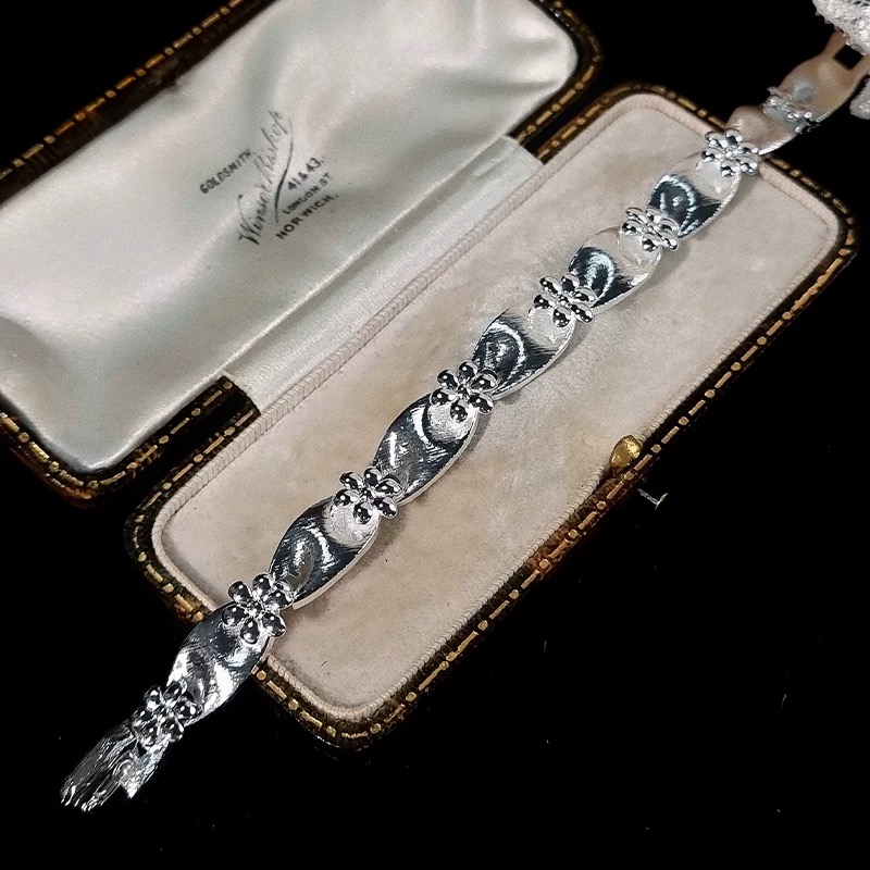 Vintage silver necklace clasp and chain texture