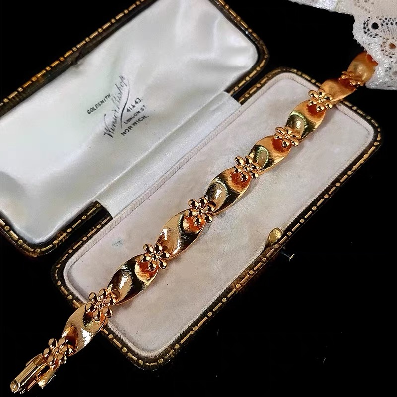 Close up of vintage silver necklace pendant filigree detail